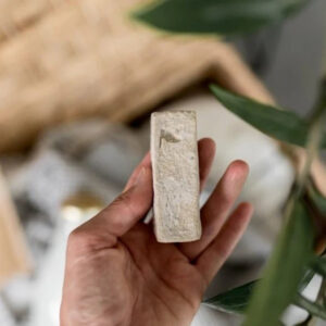 Natural solid fabric stain remover